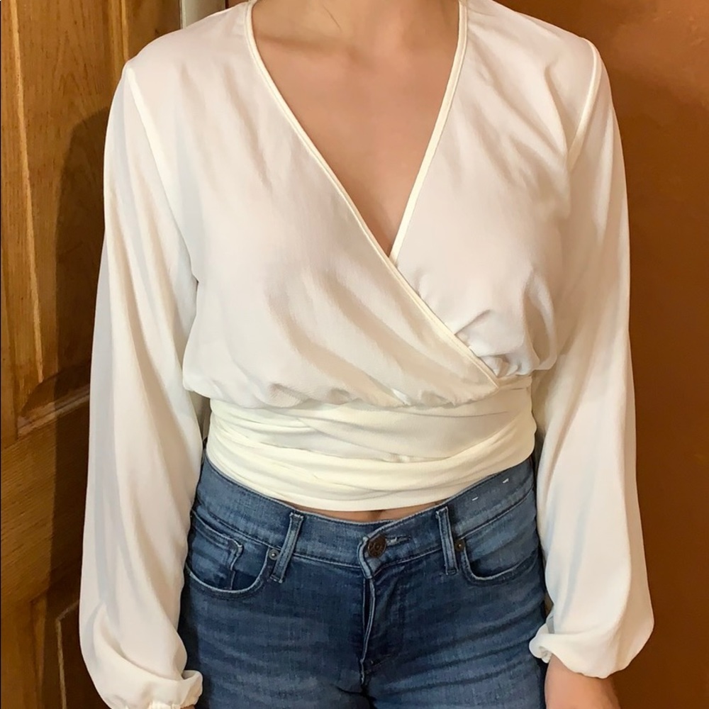 White wrap shirt. Very pretty. New with tags.